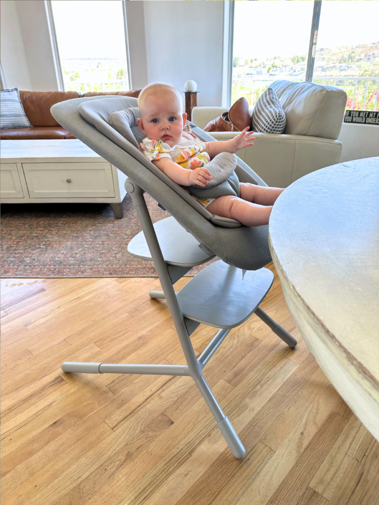Cybex Lemo High Chair with infant seat attached and baby in it at the table