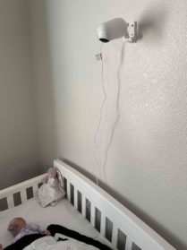 Momcozy Video Baby Monitor installed on wall