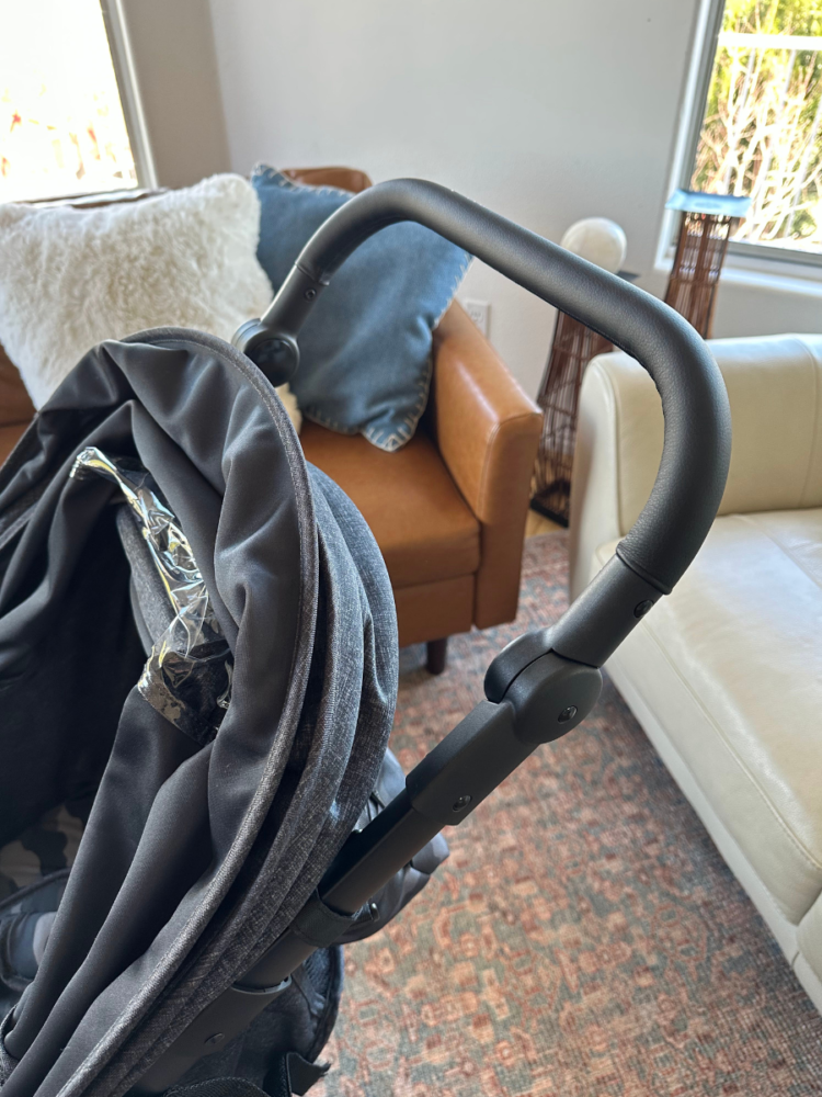 the adjustable, comfortable leather handlebar of the babyGap trek jogging stroller